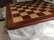 Yellow Rounded wooden chess board Padauk Boxwood, for Table, Packaging Type : cardboard
