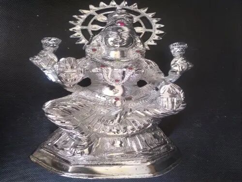 Silver Metal Lakshmi Solid Statue, Packaging Type : Wrapped Pack