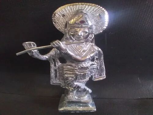 Silver Metal Lord Krishna Statue, Packaging Type : Wrapped Packing