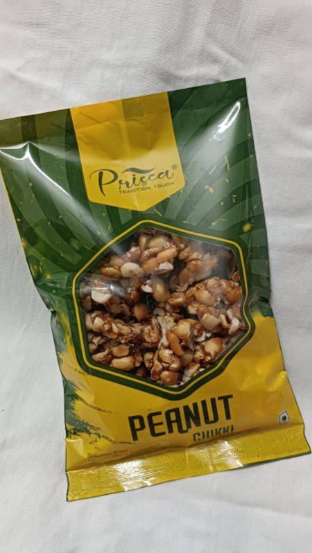 Golden brown Prisca Soild Roasted Groundnut jaggery Peanut Chikki 200gm pouch, for Food, Taste : Sweet