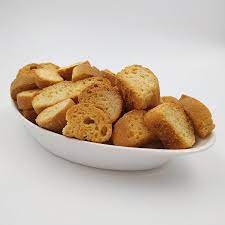 Brown Crunchy Milk Rusks, for Eating, Breakfast Use, Packaging Type : Plastic Packets