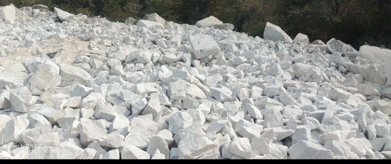 Plain Non Polished Dolomite(Marble) Lumps, for Industrial Use, Packaging Size : LOOSE