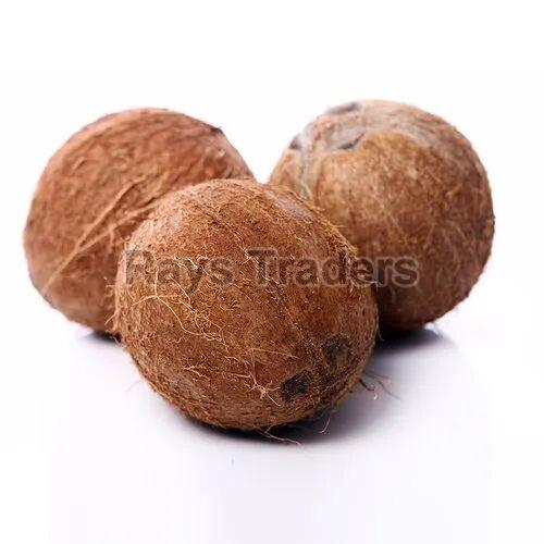 Brown Solid A Grade Semi Husked Coconut, for Pooja, Cooking, Packaging Type : Gunny Bags