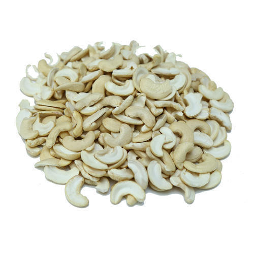 Natural Split Cashew Nuts, for Sweets, Direct Consumption, Packaging Type : Gunny Bags