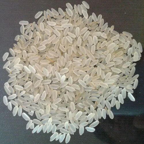White Natural Parboiled Rice, for Cooking, Packaging Type : Gunny Bags