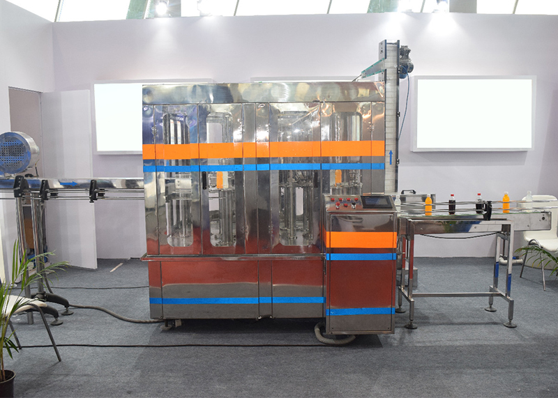 Electric Mild Steel Mineral Water Filling Machine, Specialities : Rust Proof, Long Life, High Performance