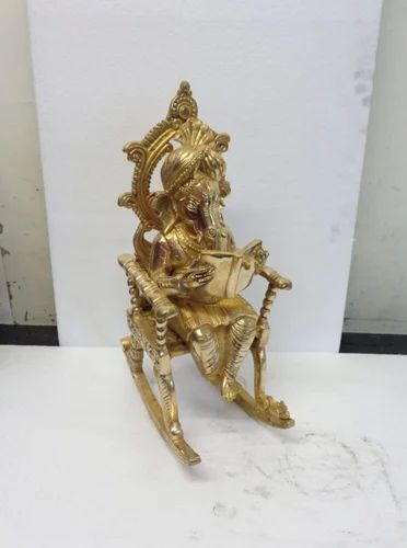 Golden Brass Ganesha Statue Sitting On Chair, for Interior Decor, Packaging Type : Carton Box