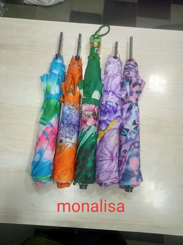 Polyester Printed Multicolor Umbrella, for Protection From Sunlight, Raining, Feature : Colorful Pattern