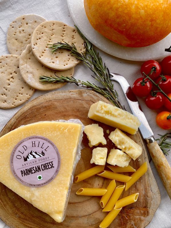 Indian mountain foods in Nainital Manufacturer of 200gram parmesan cheese & Grated Parmesan