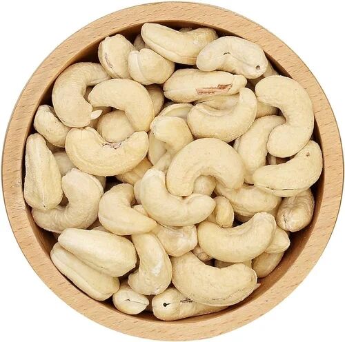 Creamy White Whole Premium Cashew Nuts, for Oil, Cooking, Purity : 100%