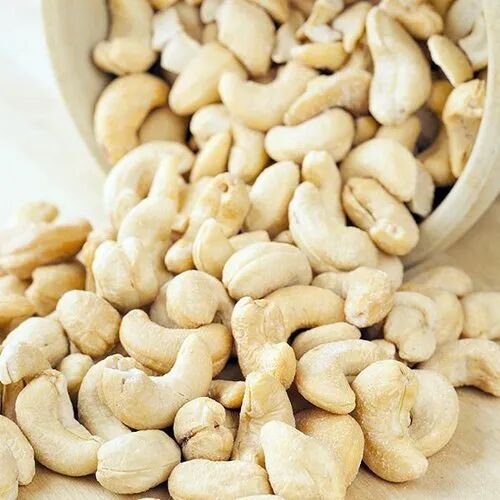 Creamy White Whole Cashew Nuts, for Oil, Cooking, Purity : 100%