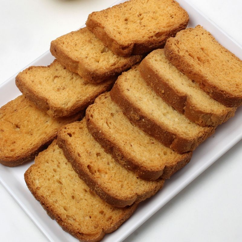 Brown Crispy Rusk Toast, for Eating Purpose, Packaging Type : Plastic Packets