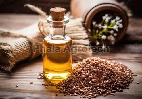 Yellow Natural Flaxseed Oil, for Cooking, Packaging Type : Bottle