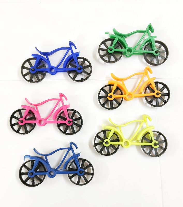 Plain Plastic Cycle Toy, for Baby Playing, Feature : Attractive Look, Colorful Pattern, Light Weight