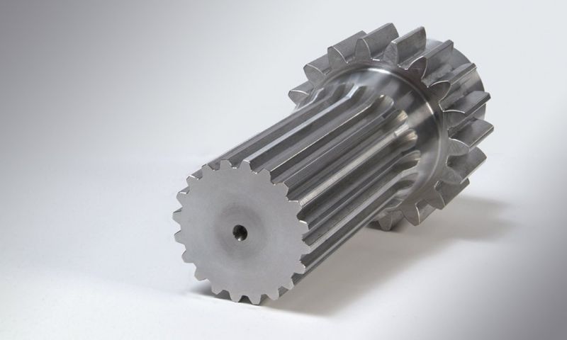 Grey Carbon Steel Sprocket Shaft, for Industrial Use, Feature : High Strength, Rust Proof