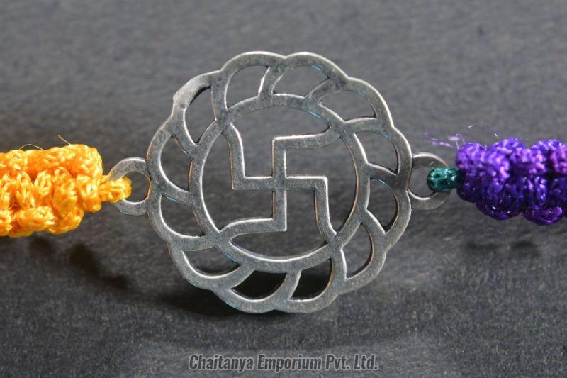 Intricate Swastik Design Silver Rakhi