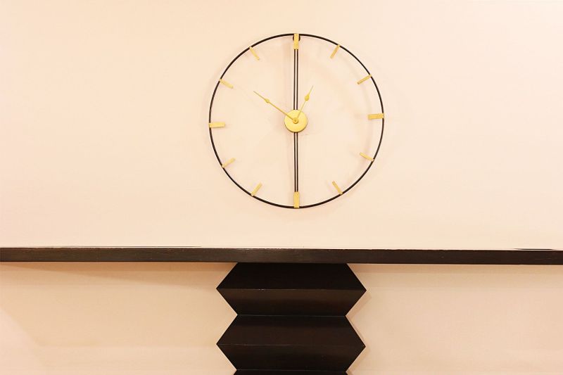 Black Metal Wall Clock with Golden Markings