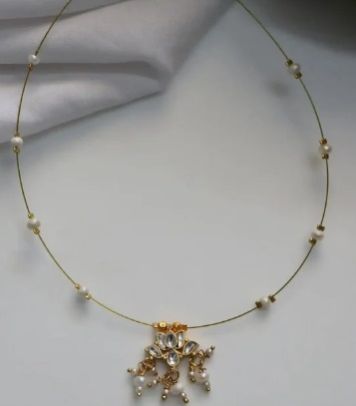 Women Invisible Necklace With Pearls and Flower Design