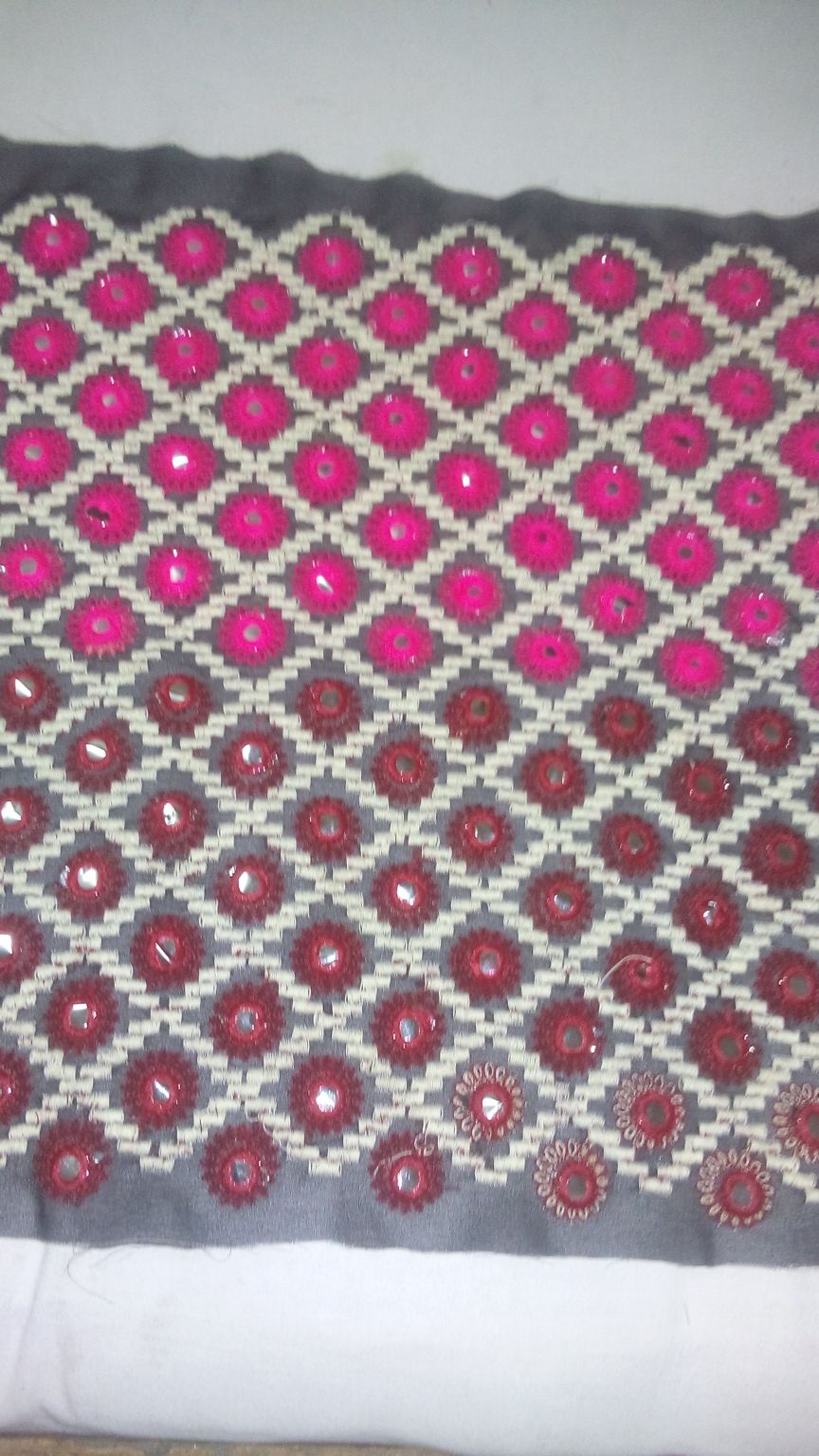 Multi Head and Zari Embroidery On Net Fabrics