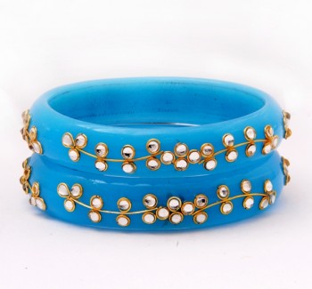 Sky blue bangles with kundan floral pattern