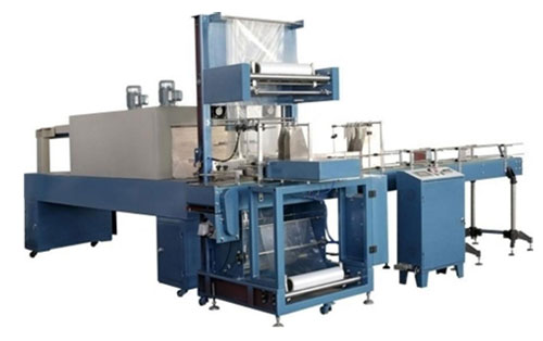 Automatic shrink wrapping machines