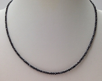 BLACK DIAMONDS FACETED BEADS/STRANDS