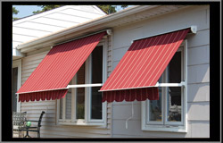 Drop arm awnings