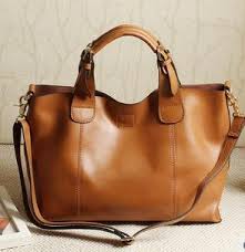 Polished Ladies Leather Handbags, for Formal Wear, Style : Modern