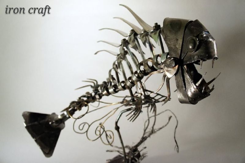 iron sculpture of fish