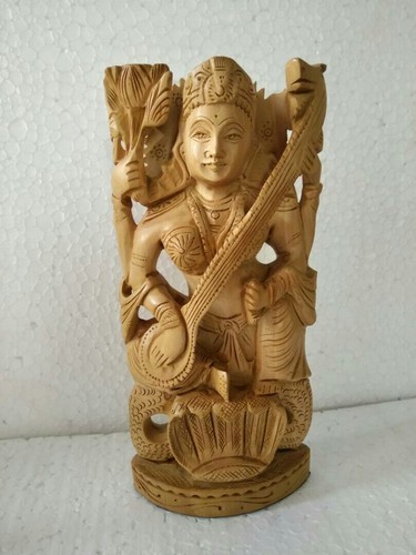 Wooden Saraswati Statue, for Religious, Color : Brown