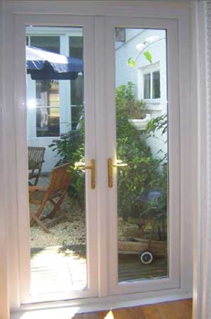 Polished UPVC Doors, for Home, Hotel, Restaurant, Frame Color : Grey