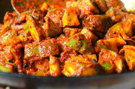 Mango Pickle, Feature : Tangy spicy