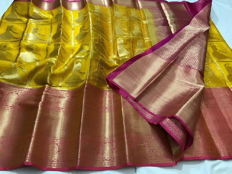 Kanchi kora silk sarees with heavy pallu and brocade blouse