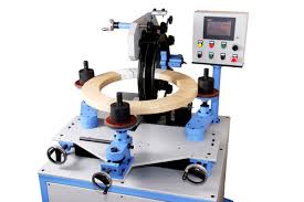 Toroidal coil winding machine