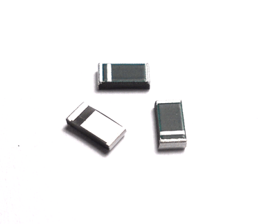 Wraparound Chip Resistors w/ One Extended Mounting Pad