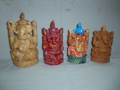 Polished Wooden Ganesha Statues, for Home, Office, Shop, Feature : Best Quality, Complete Finishing