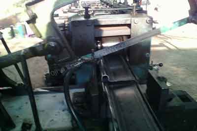 Rolling Shutter Bottom Machine