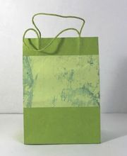 handmade paper given marble print handles bags