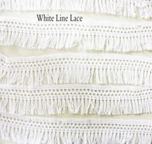 White fringes tassels