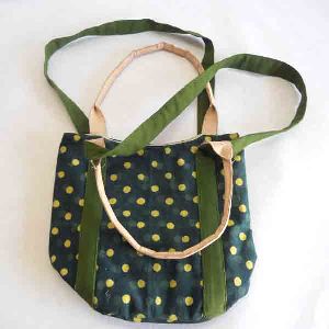 Screen printed canvas bag with leather being handbag
