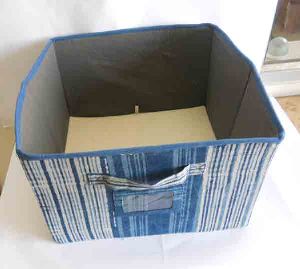 Foldable cardboard fabric storage box