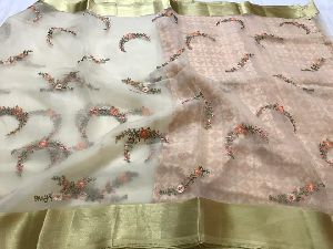 organza sarees with hand embroidery work and kanchi weaving border