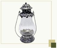 Glass lantern with silver antique finish top and bottom