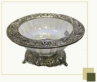 White decorative glass bowl with silver antique work