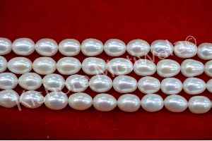 10 MM RICE SHAPE WHITE COLOR FRESHWATER PEARL BEADS