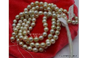 BROWNISH GOLDEN COLOR SOUTH SEA ROUND SHAPE 9 MM PEARL BEADS