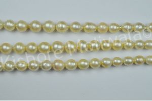 CREAM COLOR 11-15 MM ROUND SHAPE SOUTH SEA PEARL BEADS