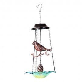 Hanging metal bird with glass base chime