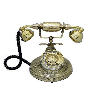 Brass colour vintage table phone with leaf design