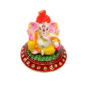 Ganeshji with pagdi on round marble chowki